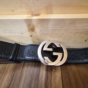 Gucci Embossed Black Leather Belt Bag with Silver Emblem